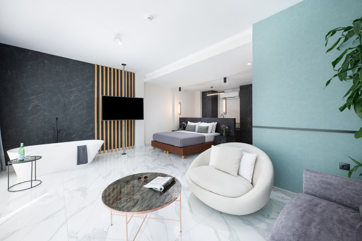 Enattica Suites, modern living room with a couch and a sofa