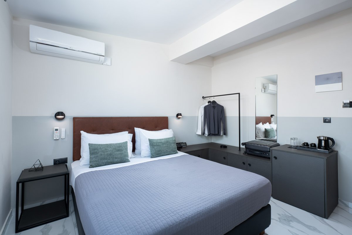 Enattica Suites, comfortable room with double bed