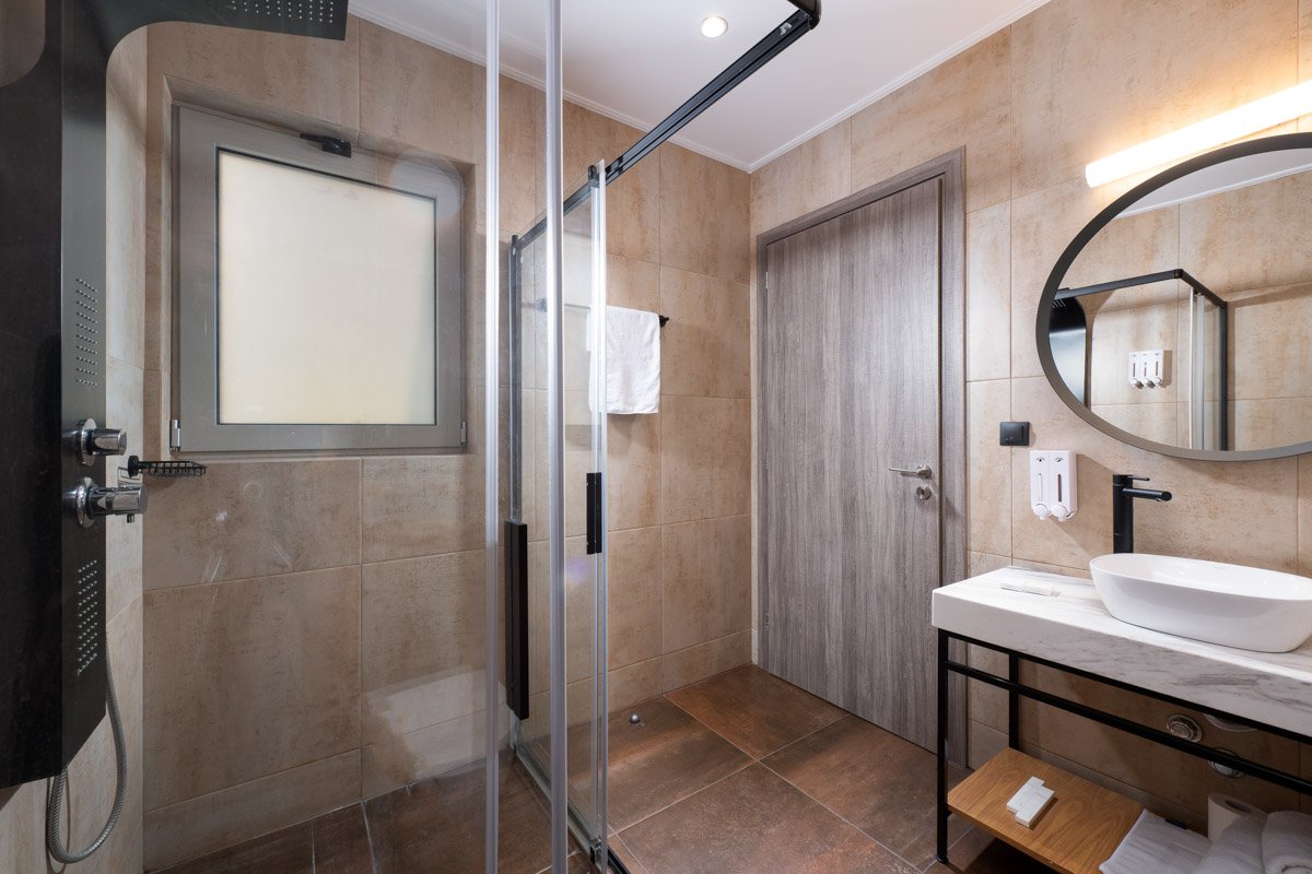Enattica Suites, bathroom of Standard Double room