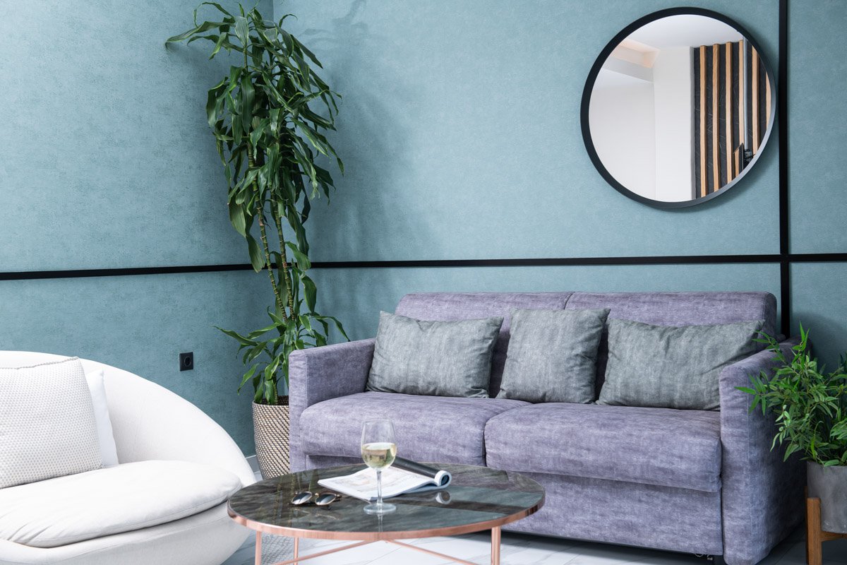 Enattica Suites, modern living room with a couch and a sofa