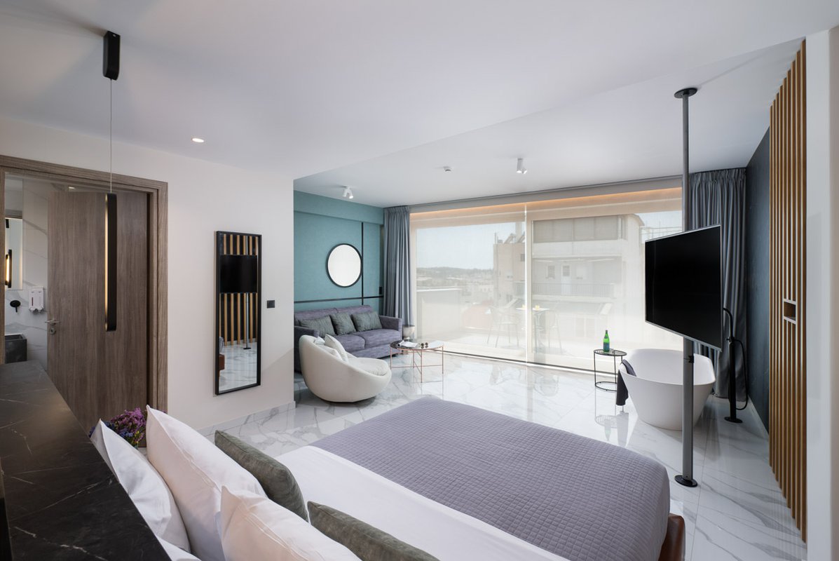 Enattica Suites, modern living room with a couch and a sofa
